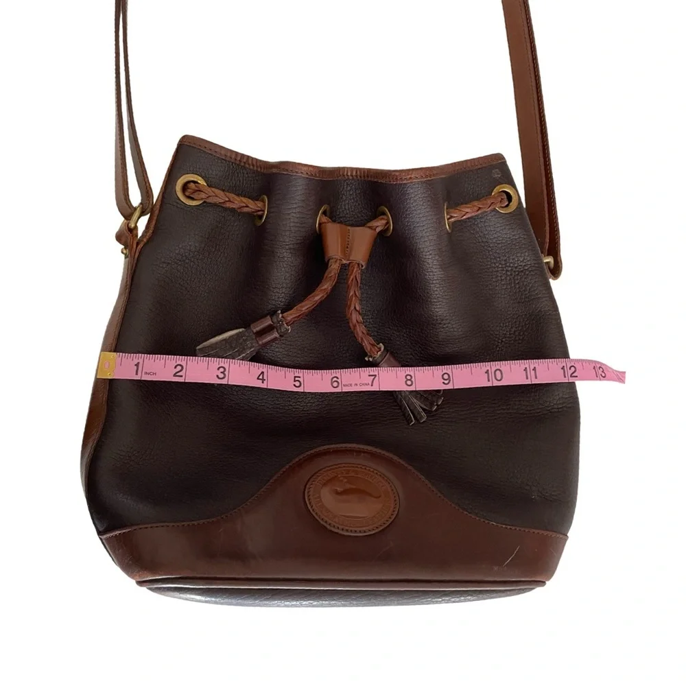 Dooney & Bourke Vintage Brown Leather Bucket Bag w/Tassel Drawstring Crossbody